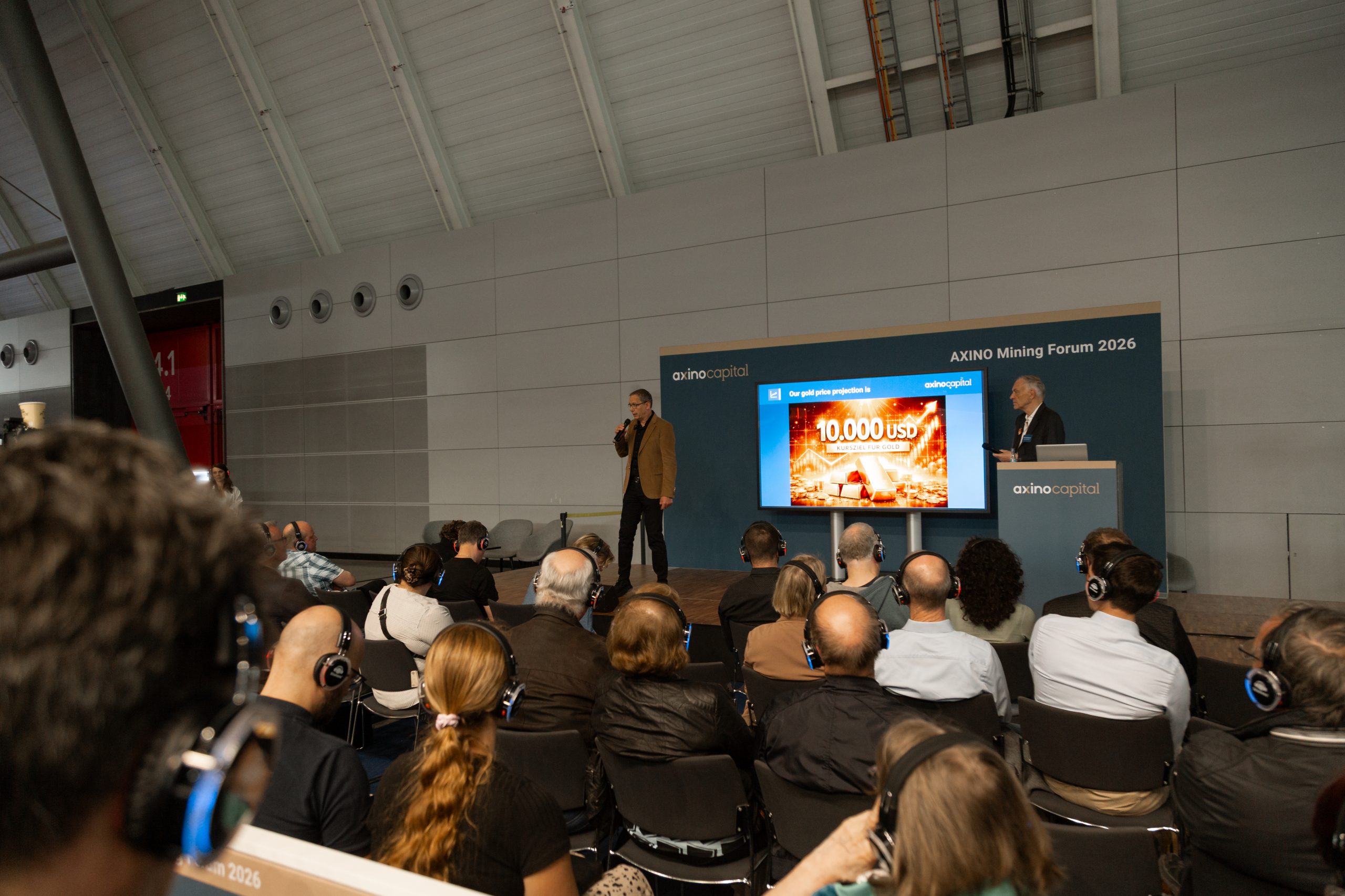 AXINO Mining Forum 2026 gallery image 13 showing investor conversations, mining company presentations and forum atmosphere in Stuttgart