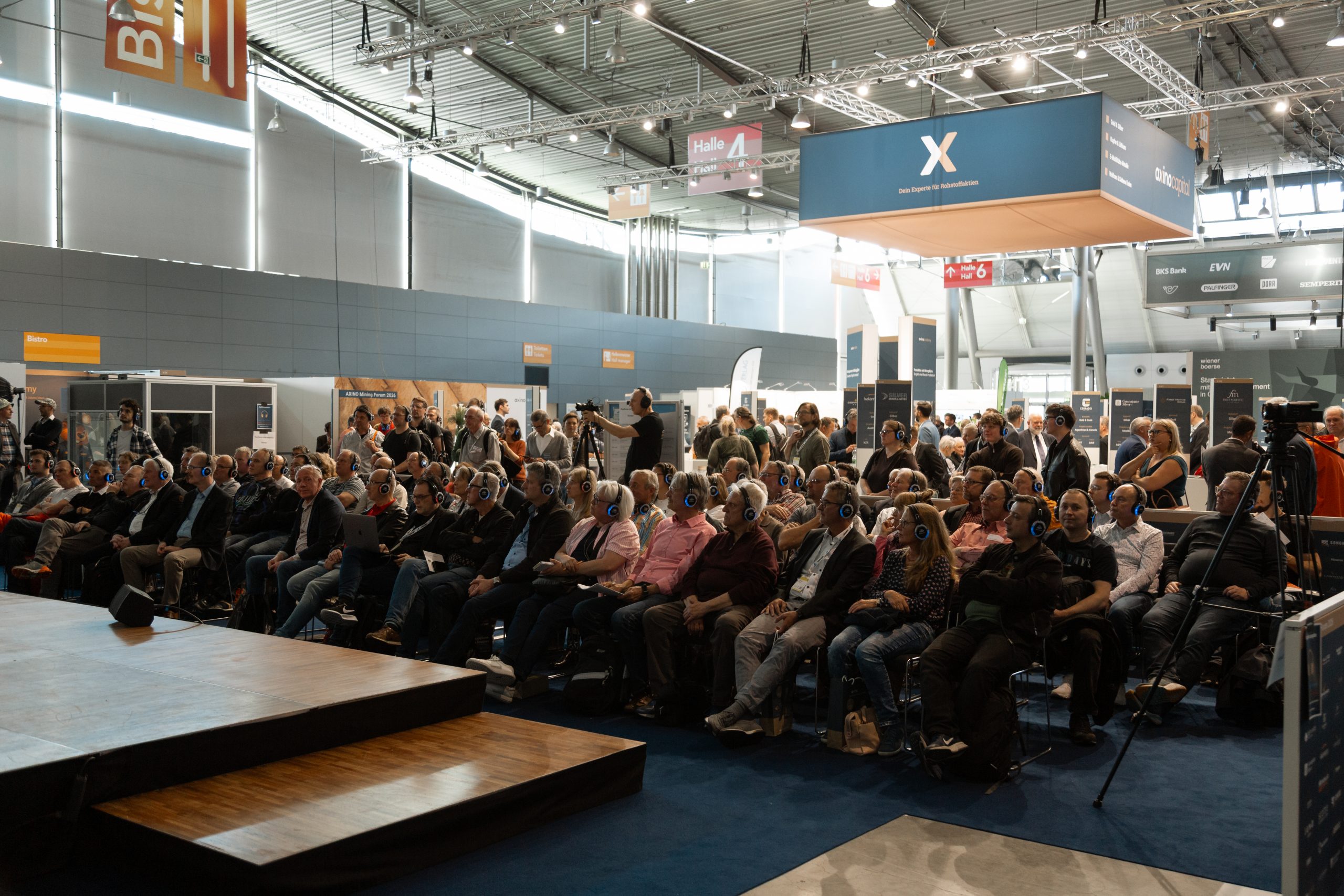 AXINO Mining Forum 2026 gallery image 18 showing investor conversations, mining company presentations and forum atmosphere in Stuttgart
