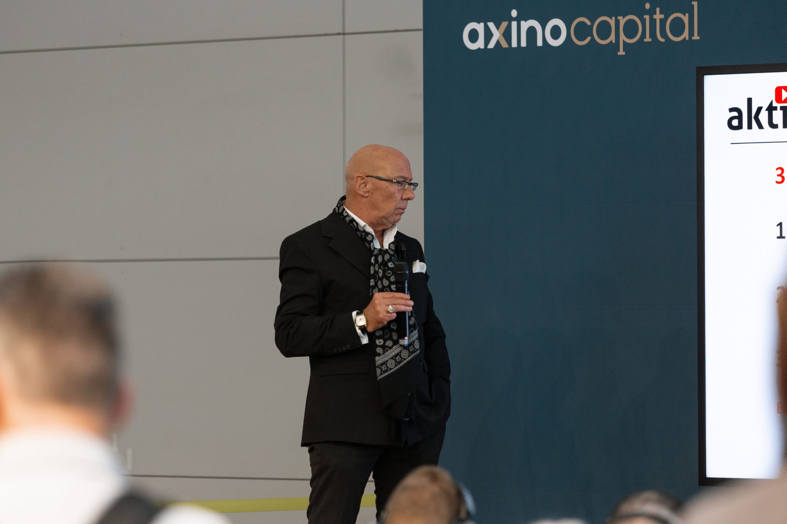 AXINO Mining Forum 2026 gallery image 22 showing investor conversations, mining company presentations and forum atmosphere in Stuttgart